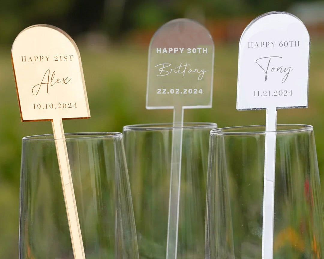 Birthday Arch Drink Stirrers samples in gold acrylic, clear acrylic, and silver acrylic materials