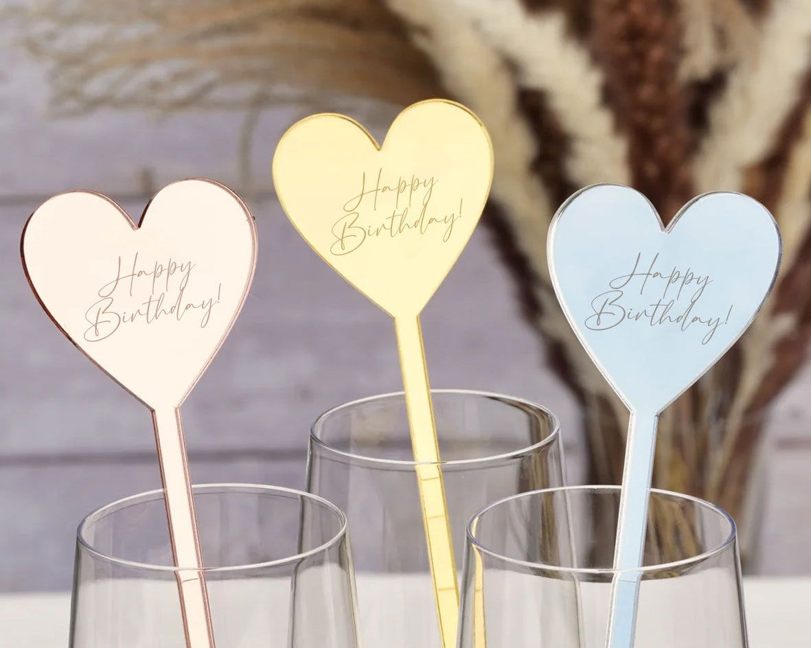 Birthday Heart Drink Stirrers sample showing rose gold, gold, and silver