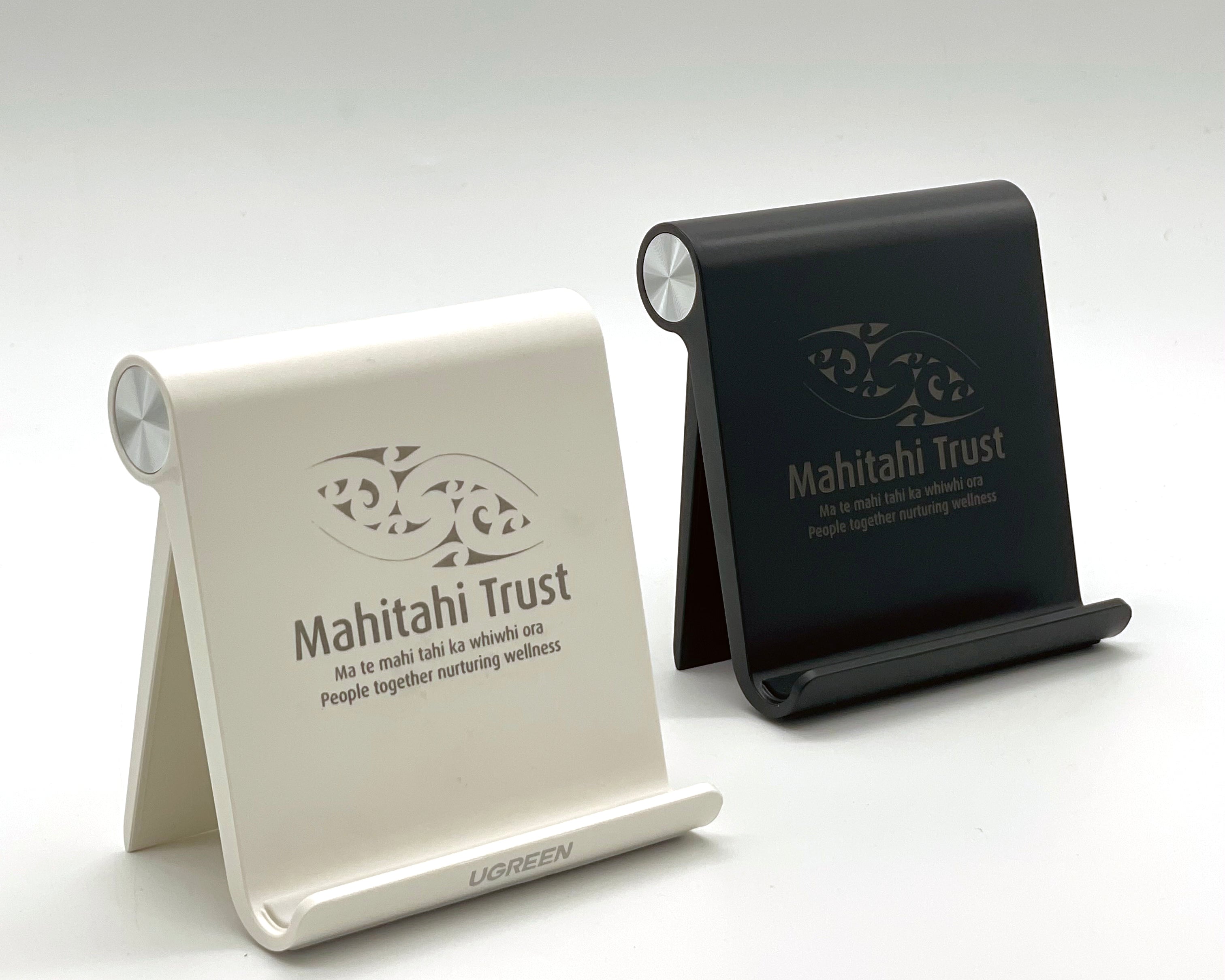 black and white phone stand with engraving