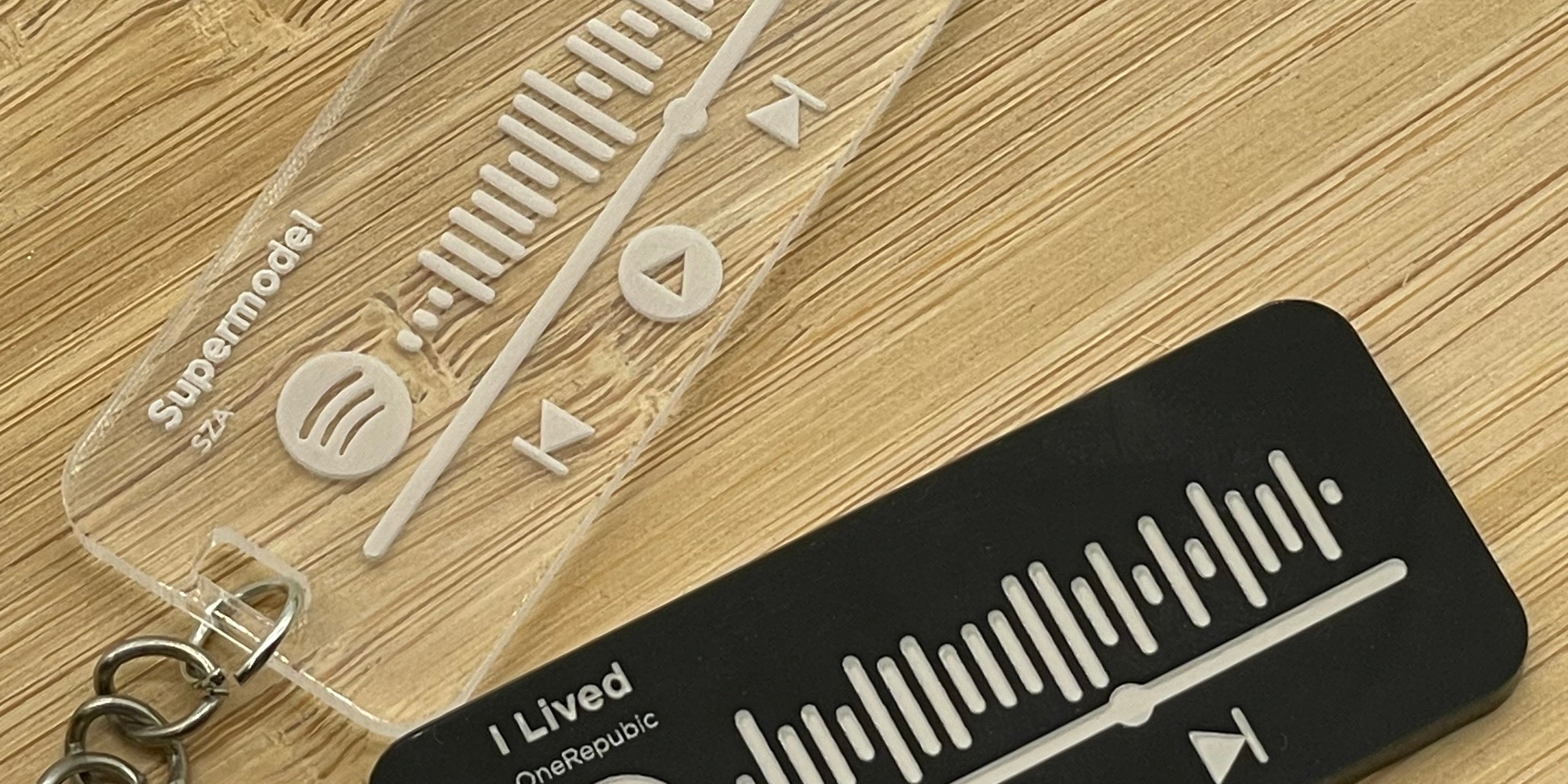 Clear acrylic and Black acrylic spotify keyrings