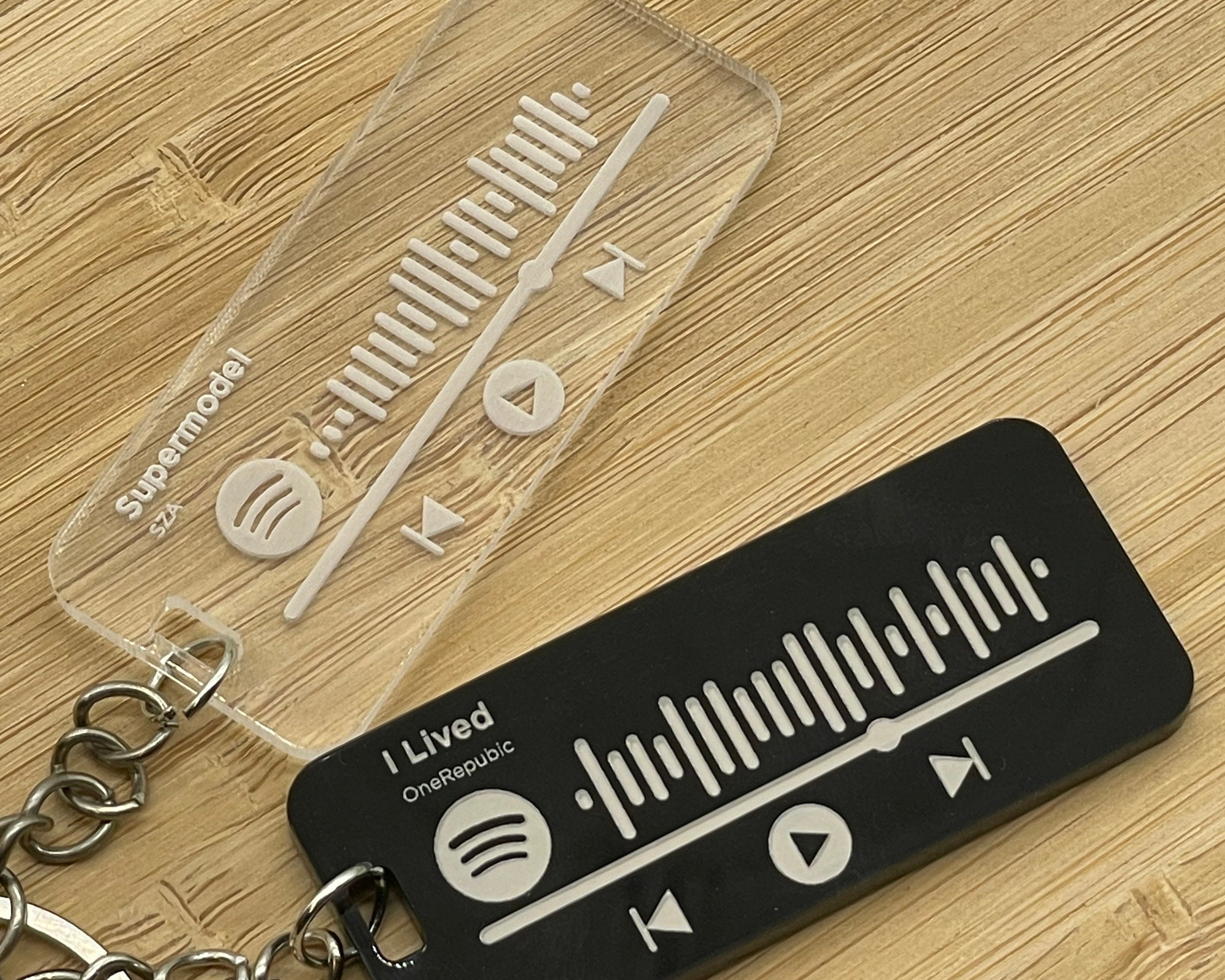 Clear acrylic and Black acrylic spotify keyrings