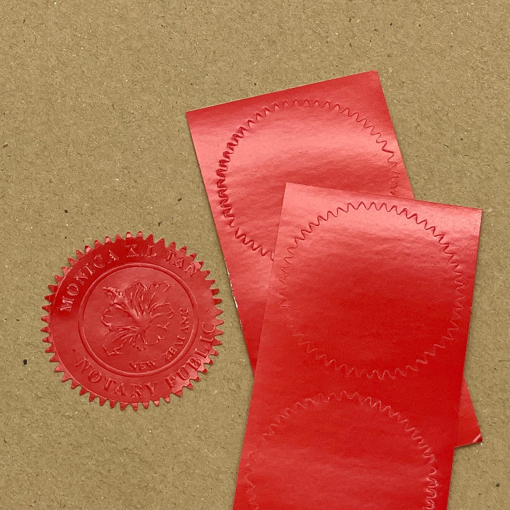 Red embossing sticker with corrugated edges