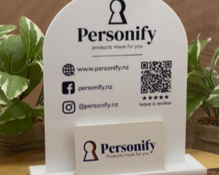 Social media business signage with business card holder