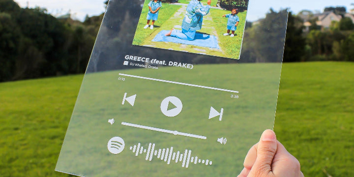 Sample customised Spotify Plaque in outdoor green field